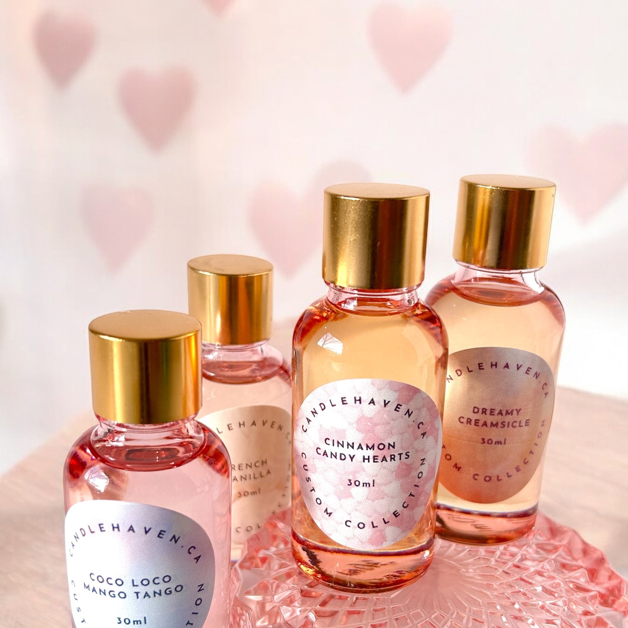 Fragrance oils for candle making in luxurious pink bottles