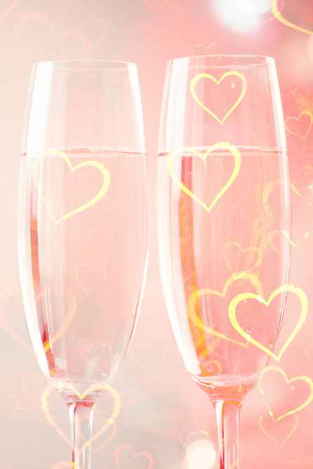 Champagne Toast BBW Canada | Two champagne flutes with heart designs on a soft pink background
