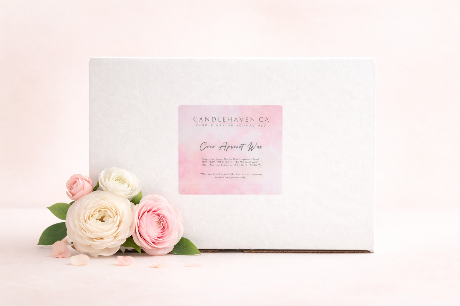 Coco apricot candle wax in white box with flowers on a light background
