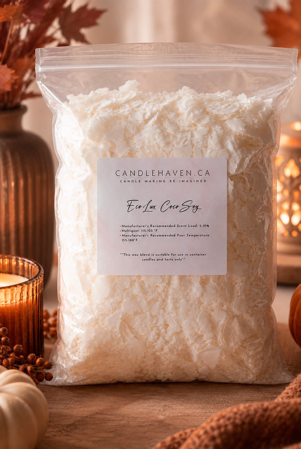 A clear plastic bag filled with white wax sits on a wooden surface, labeled Candlehaven Co. EcoLux Coco Soy Wax