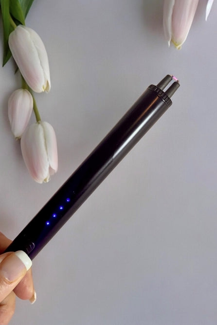 Electric lighter in back that is re-chargeable and used to light hand poured candles