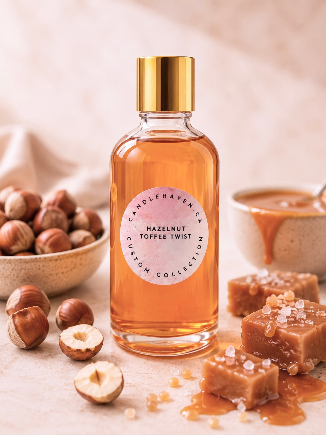 Bottle of Candlehaven hazelnut toffee twist fragrance oil for candle making with hazelnuts and toffee on a light background