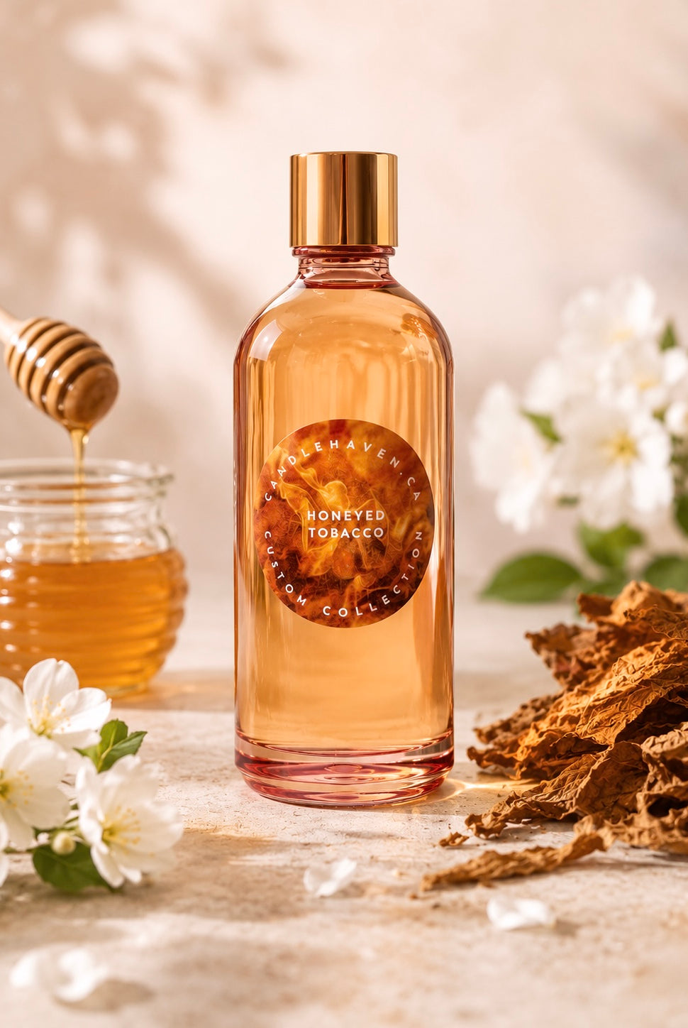 Honeyed Tobacco fragrance oil bottle with honey jar and flowers on a wooden surface
