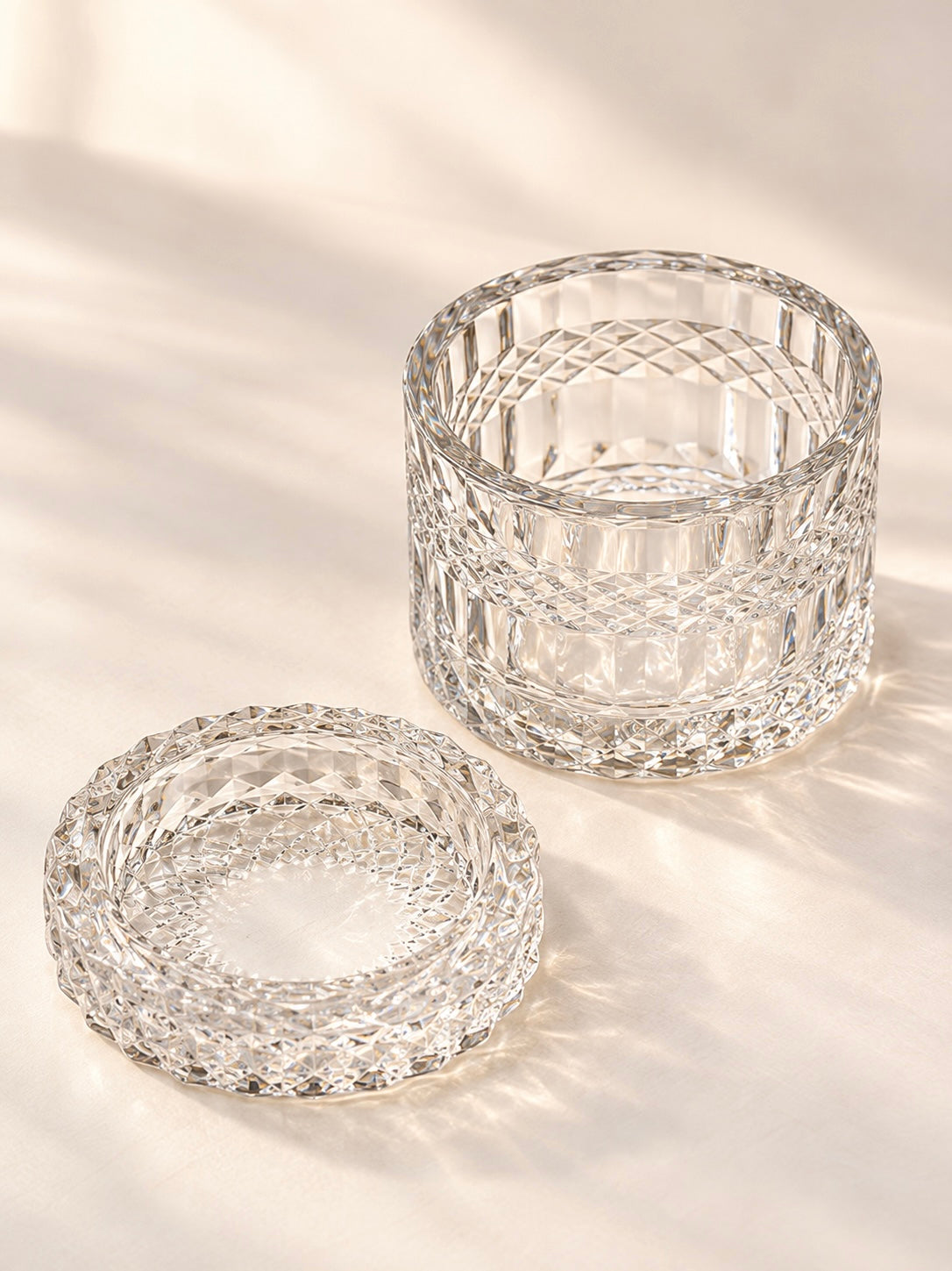 Clear glass vessel with lid used in candle making