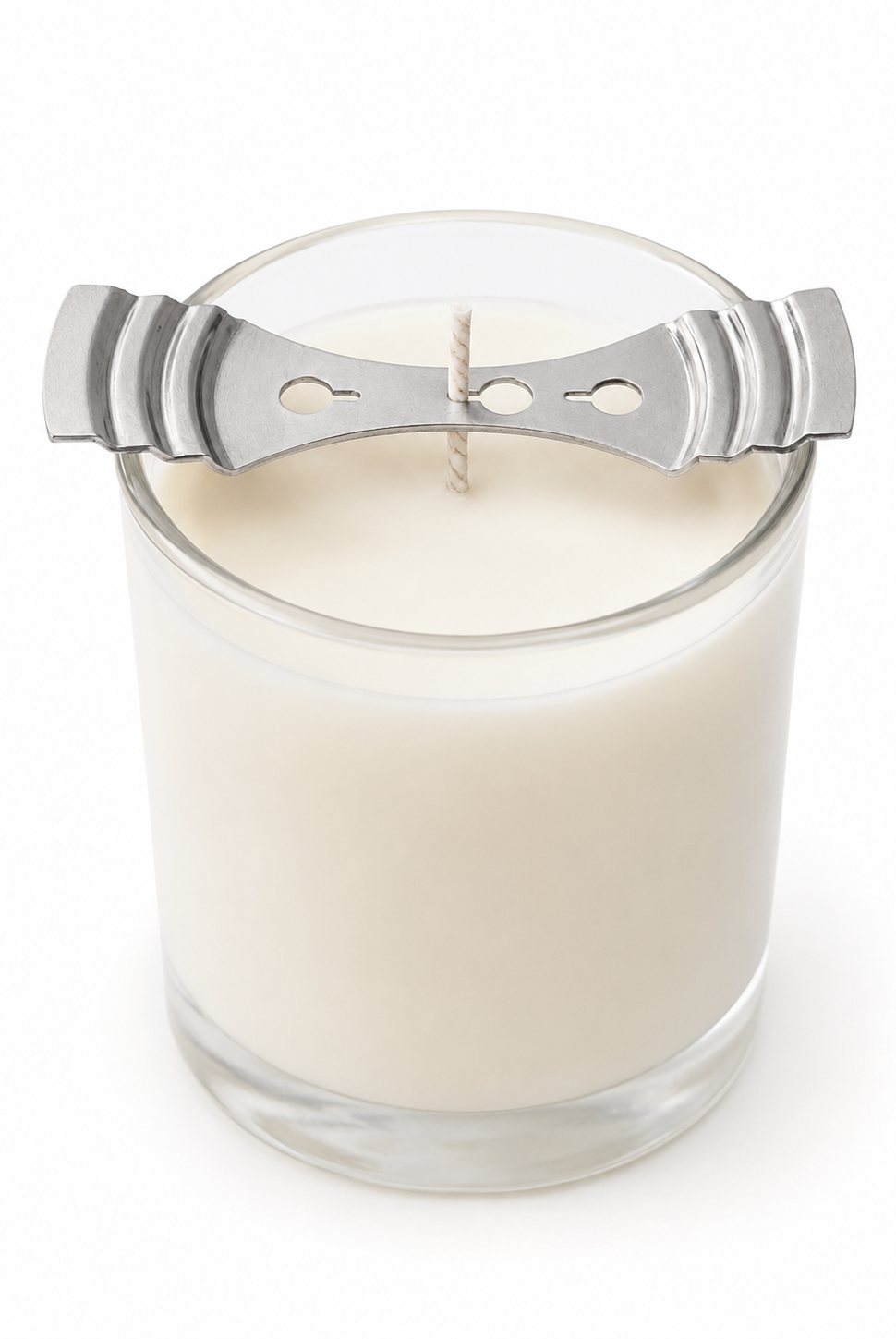 Glass candle with a metal wick setter on a white background