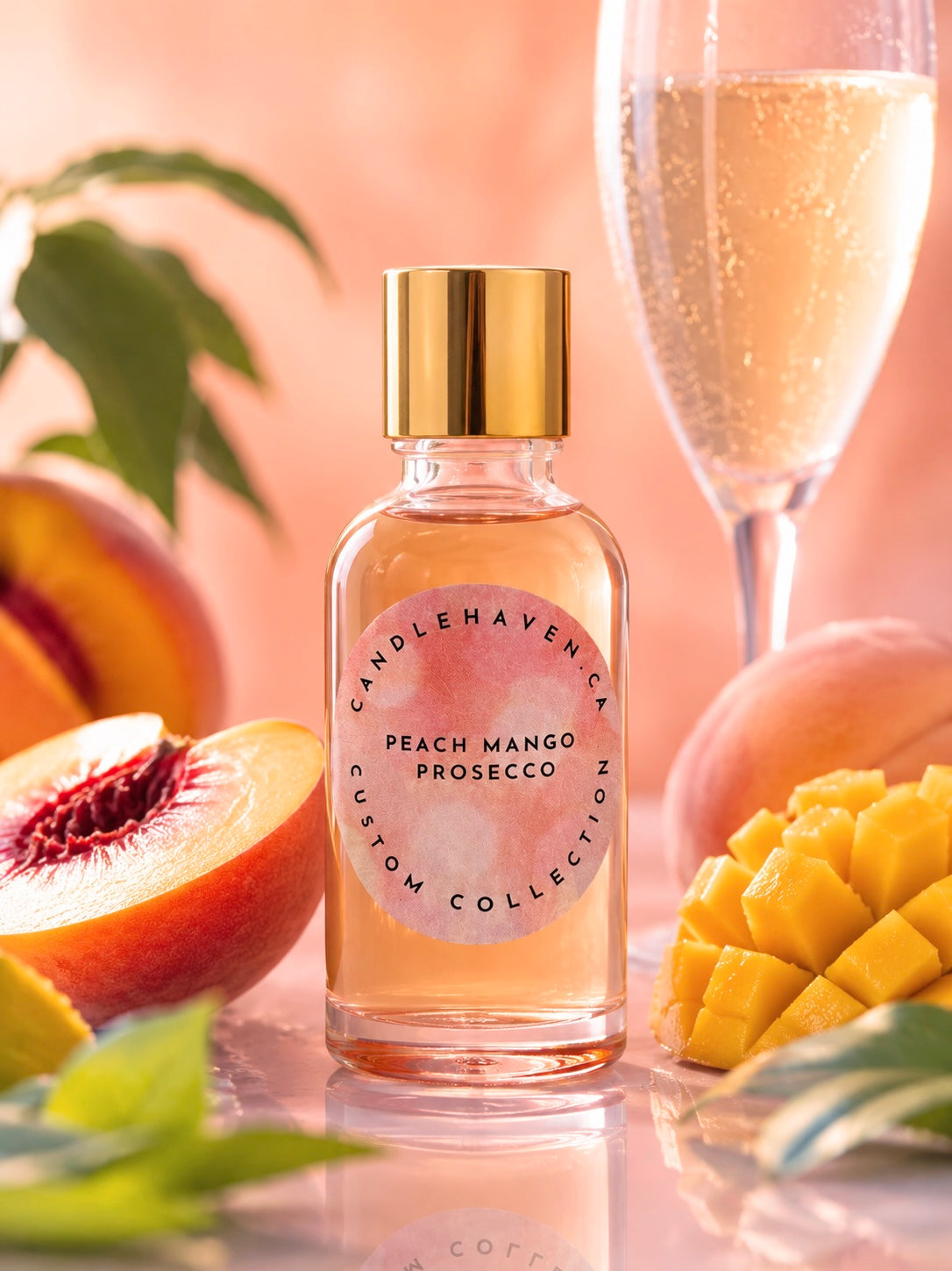 Pink bottle of peach mango prosecco fragrance oil by candlehaven on a light coloured background