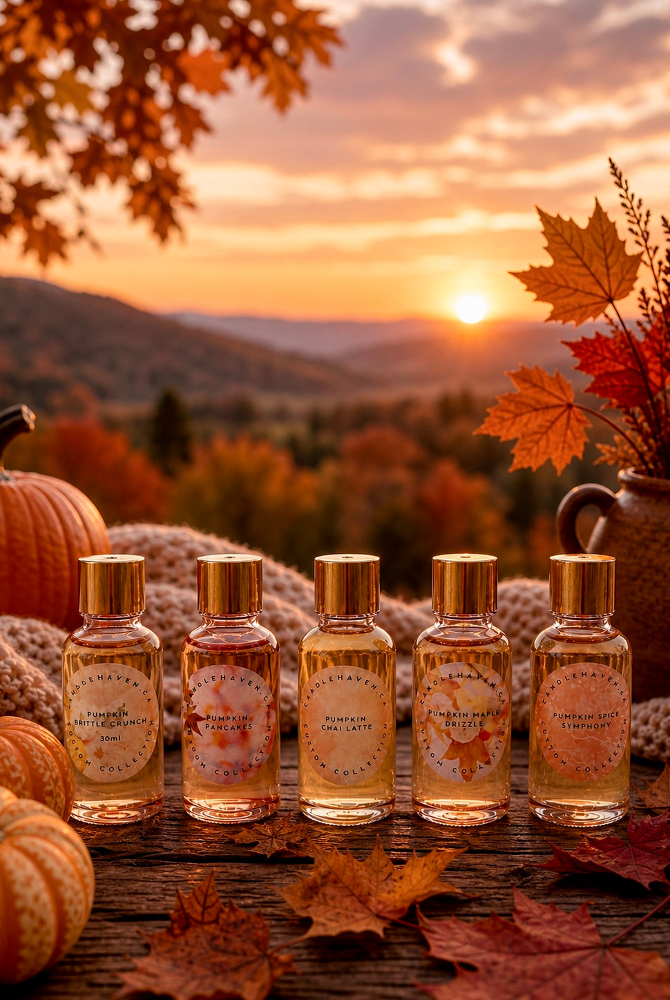 Five bottles of pumpkin style fragrance oils for candle making on a wooden surface with pumpkins and autumn leaves, set against a scenic fall sunset.