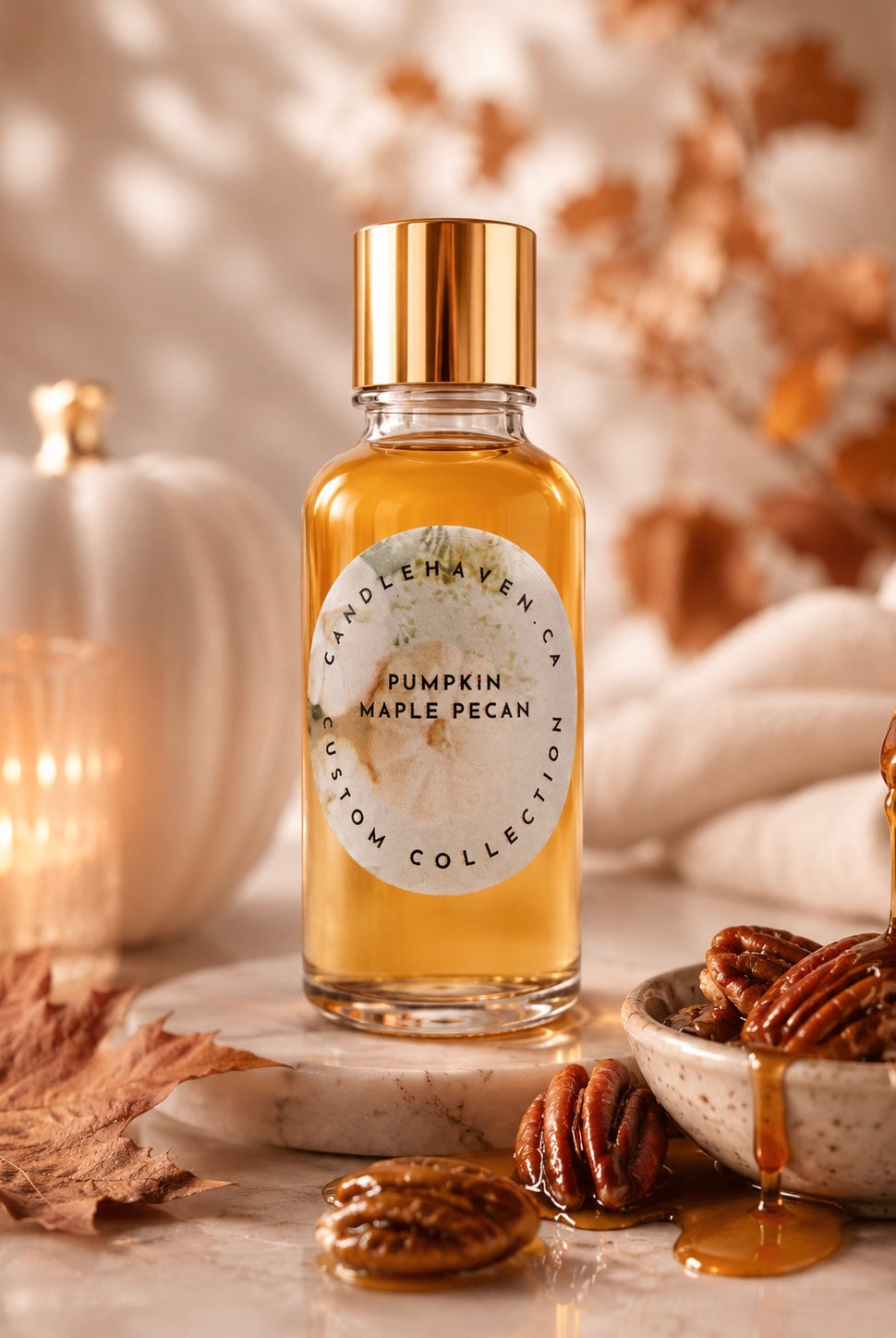 Bottle of pumpkin maple pecan fragrance oil for candle making and soap making on a decorative surface with pumpkins and pecans.