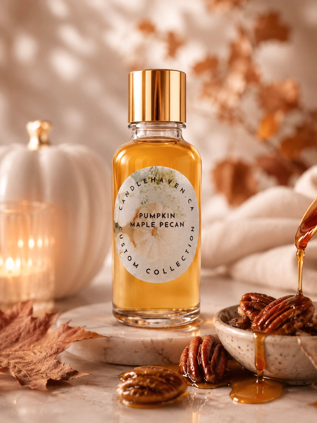 Bottle of pumpkin maple pecan fragrance oil for candle making and soap making on a decorative surface with pumpkins and pecans.