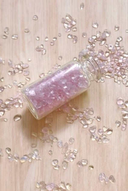 rose quartz min chips are the stone of love used to decorate candles