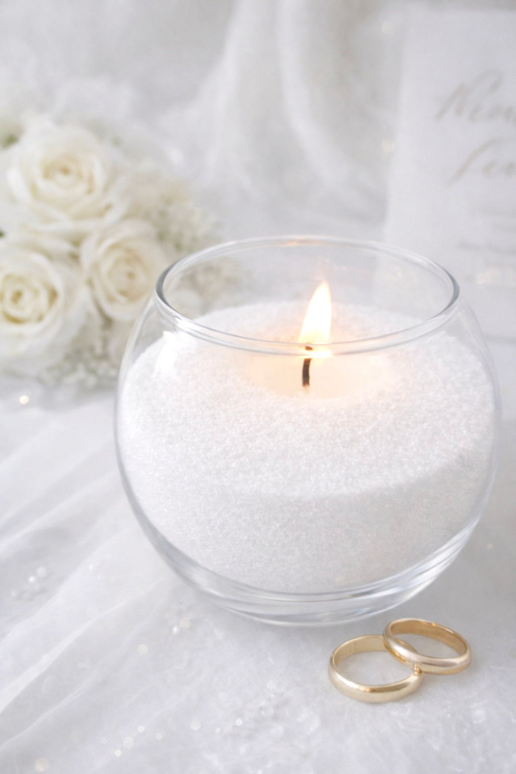 Sand wax poured into a bowl with a wedding themed background | sand wax is perfect for candles at a diy wedding.
