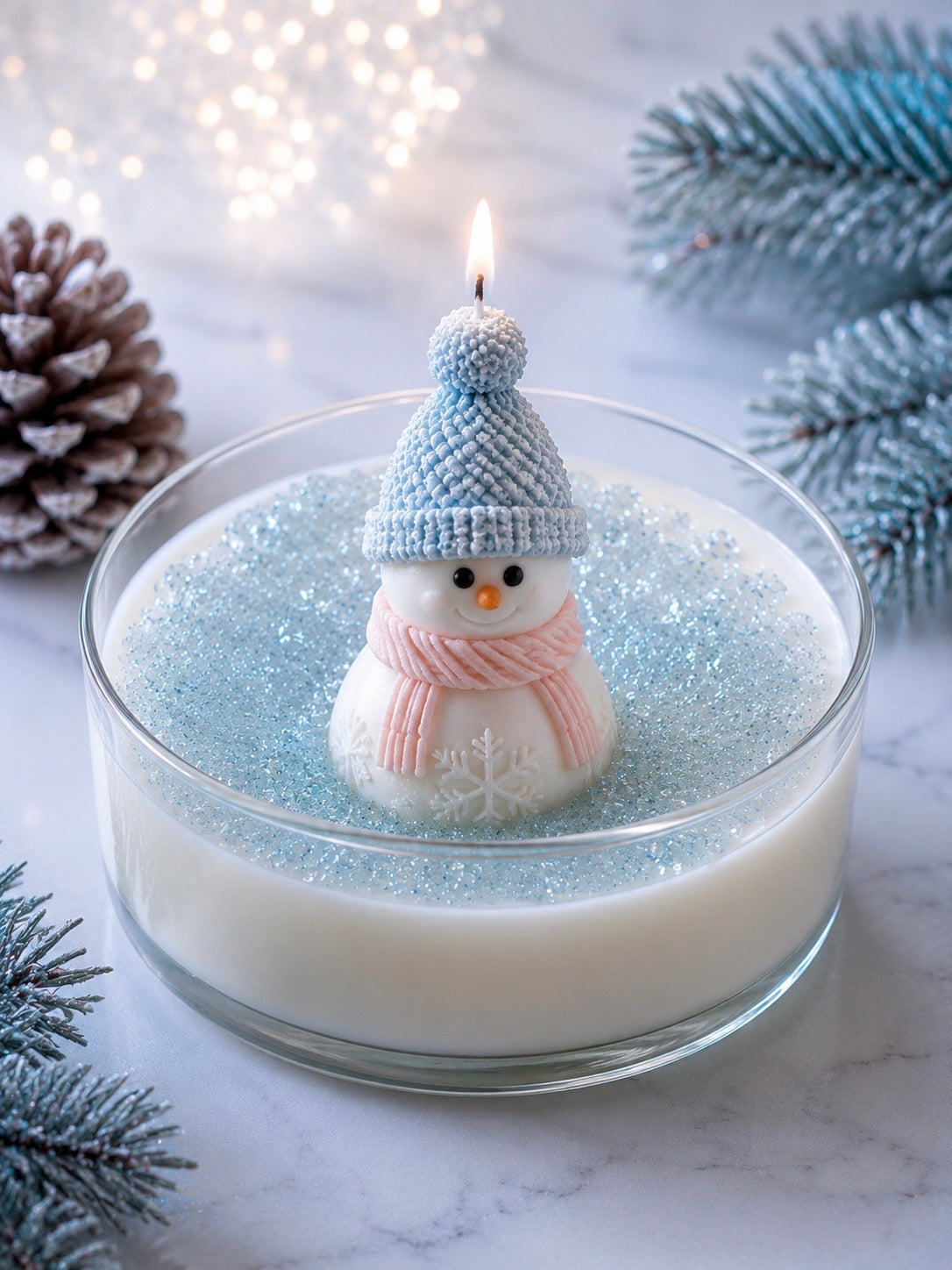 A wax snowman sitting atop a bed of white wax