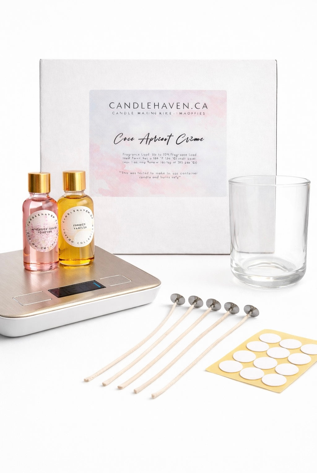 Candle making kit with coco apricot wax, fragrance oils, digital scale, wicks, wick stickers, and a Gaia vessel on a white background