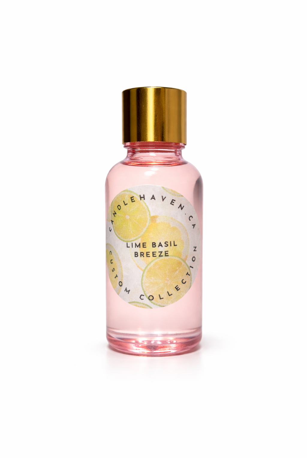 candlehaven.ca Pink fragrance oil bottle with gold cap labeled 'Lime Basil Breeze' on a white background