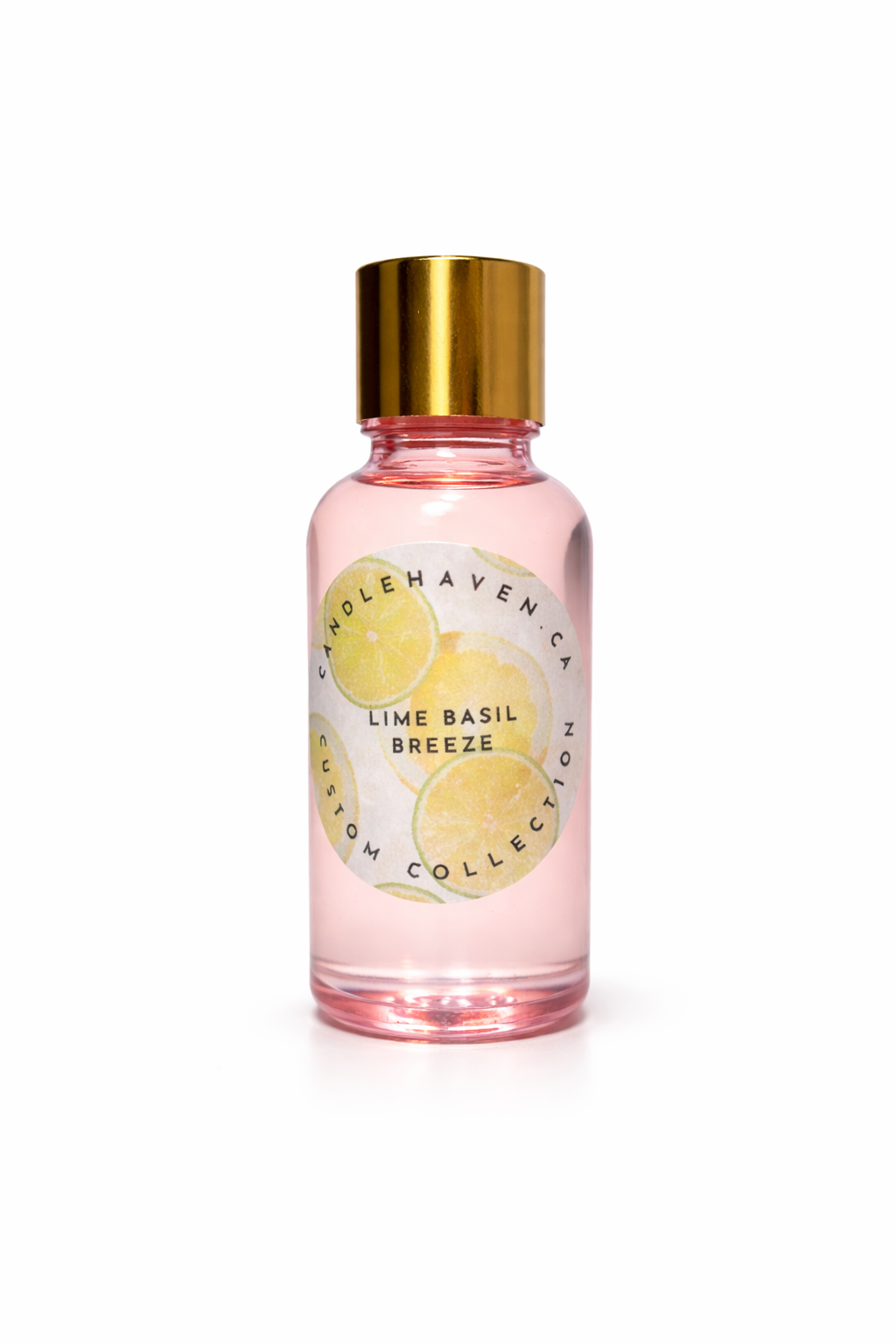 candlehaven.ca Pink fragrance oil bottle with gold cap labeled 'Lime Basil Breeze' on a white background