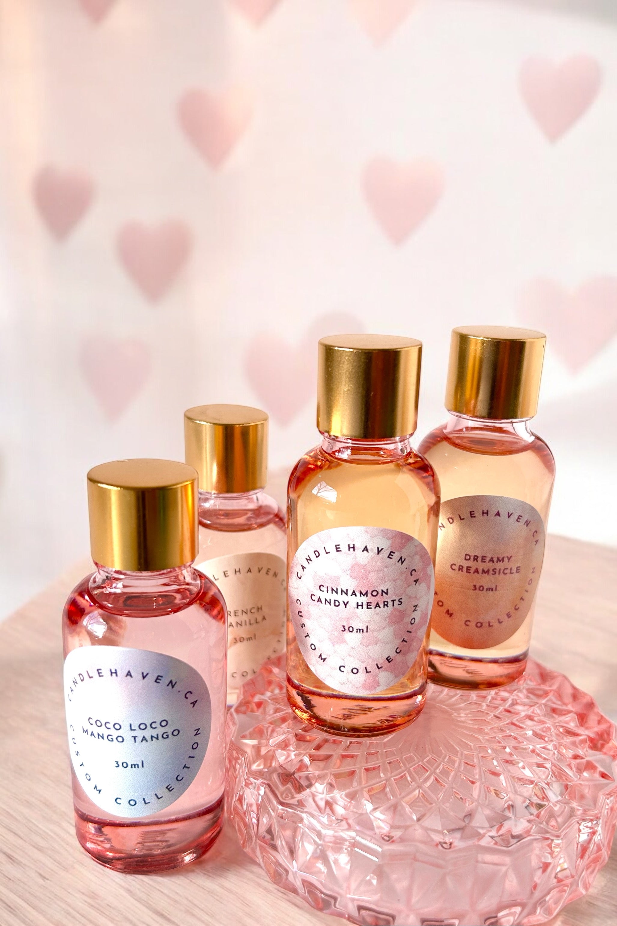 Fragrance oils for candle making in luxurious pink bottles