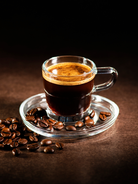 coffee candle fragrance oil canada | Clear glass cup of espresso with coffee beans on a dark background 