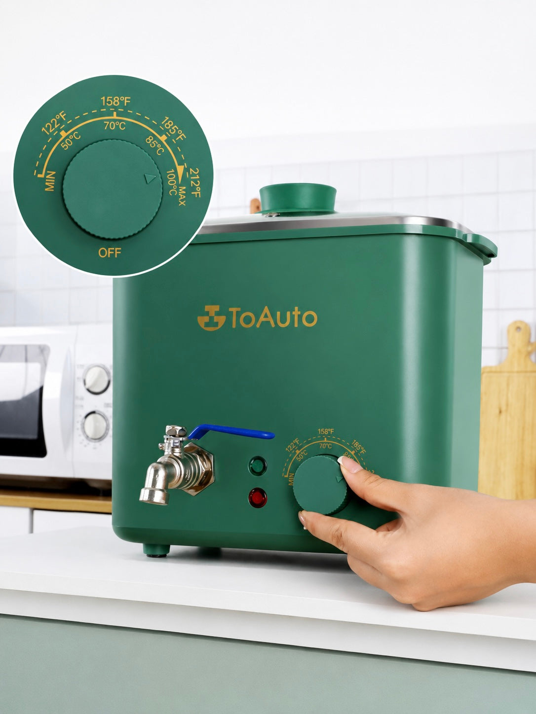 Green wax melting appliance with a hand adjusting a dial, branded 'ToAuto', on a white countertop.