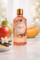 Candlehaven bottle of Apple Bottom Bliss fragrance oil with apples, pears and vanilla on a light background 