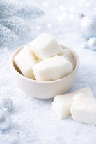 Coco Apricot Wax in a bowl on a snowy background