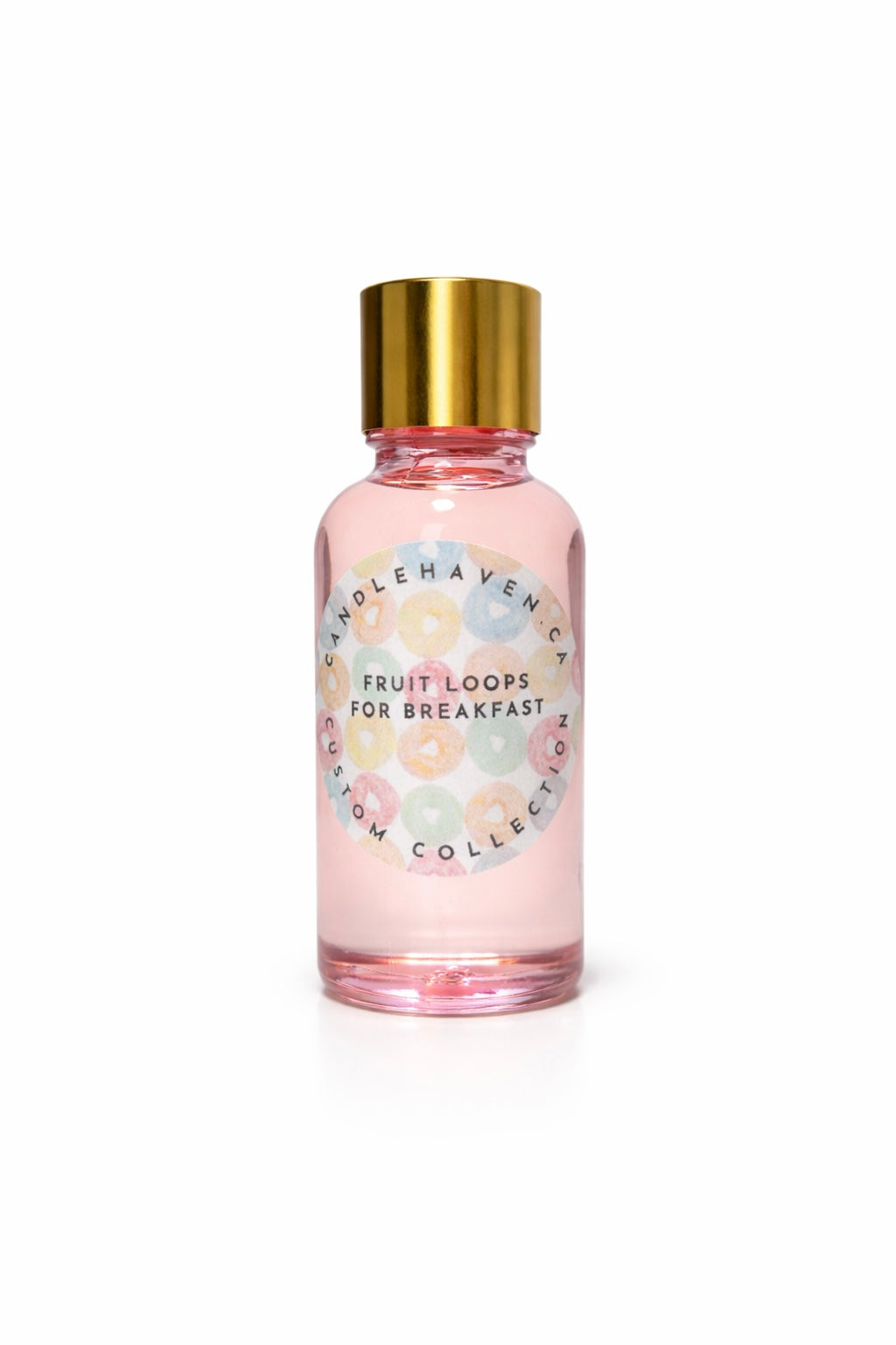 Pink bottle of fruit loop fragrance oil with gold cap on a white background