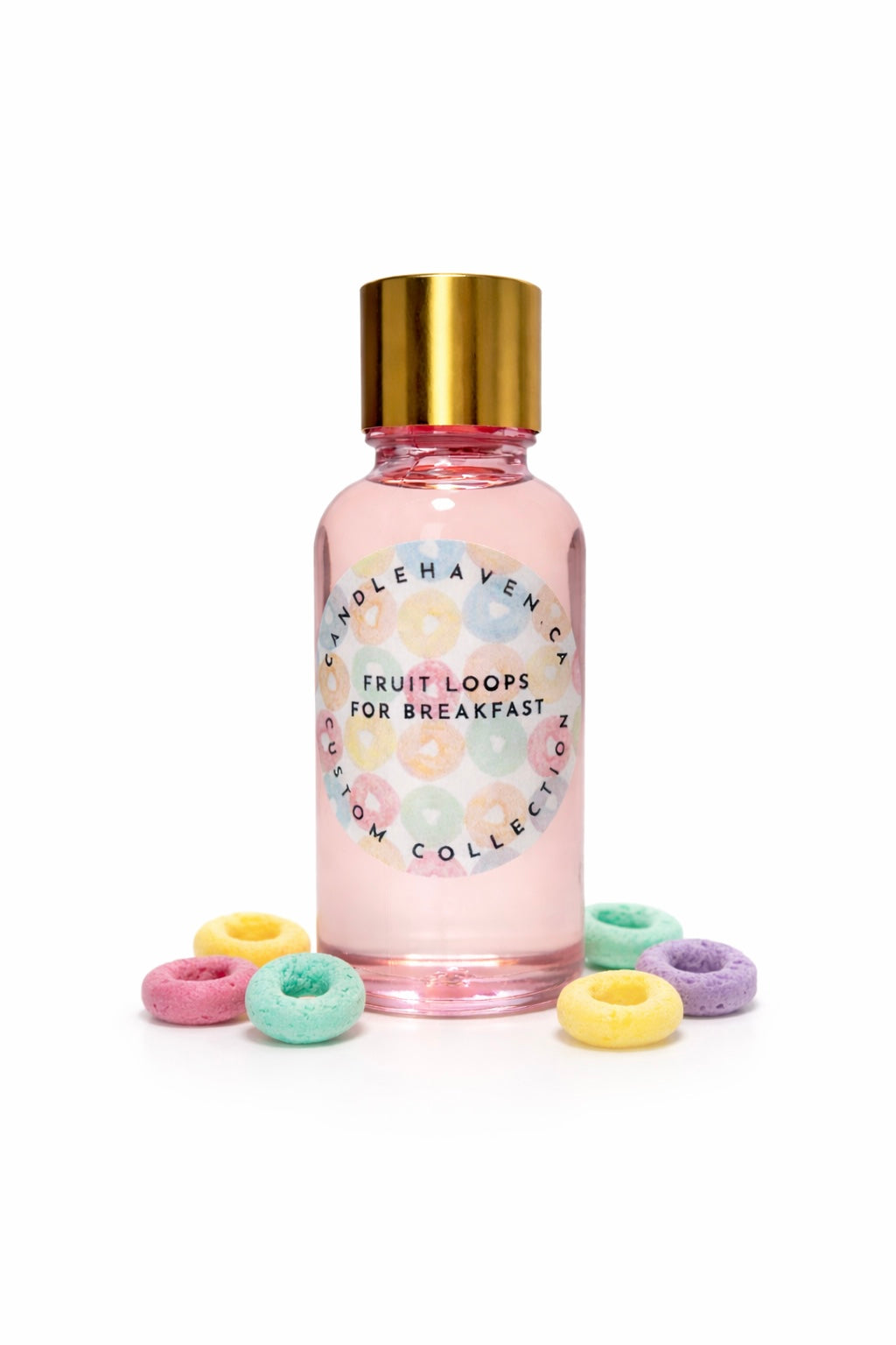 Candlehaven.ca 'Fruit Loops for Breakfast' fragrance oil bottle with fruit loops scattered on a white background