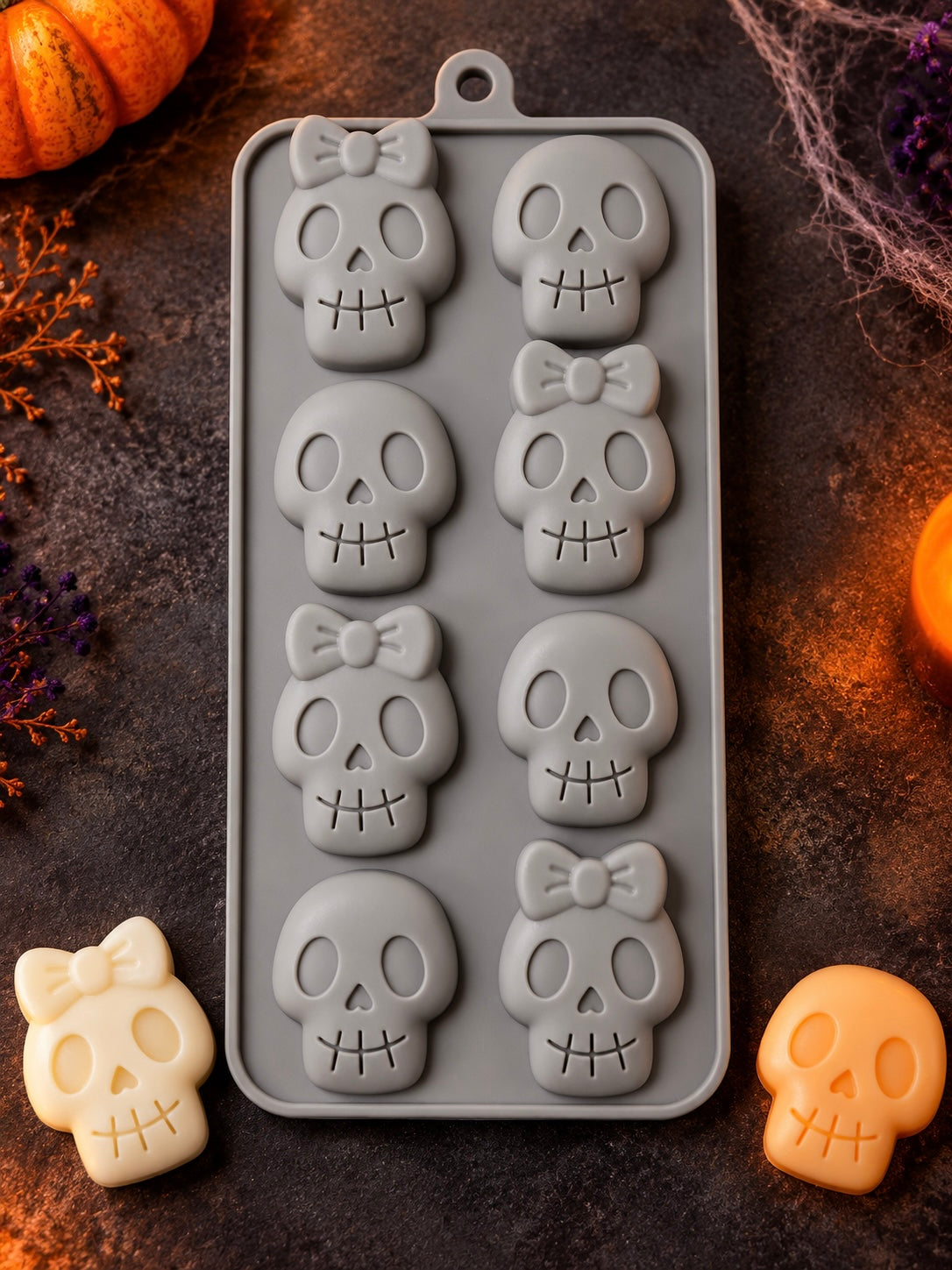 Halloween Skulls Silicone Mold for candle making on a halloween themed background