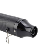 Close-up of a black handheld heat gun for candle making, showing the textured handle, a small metal loop, and the nozzle tip on a white background.