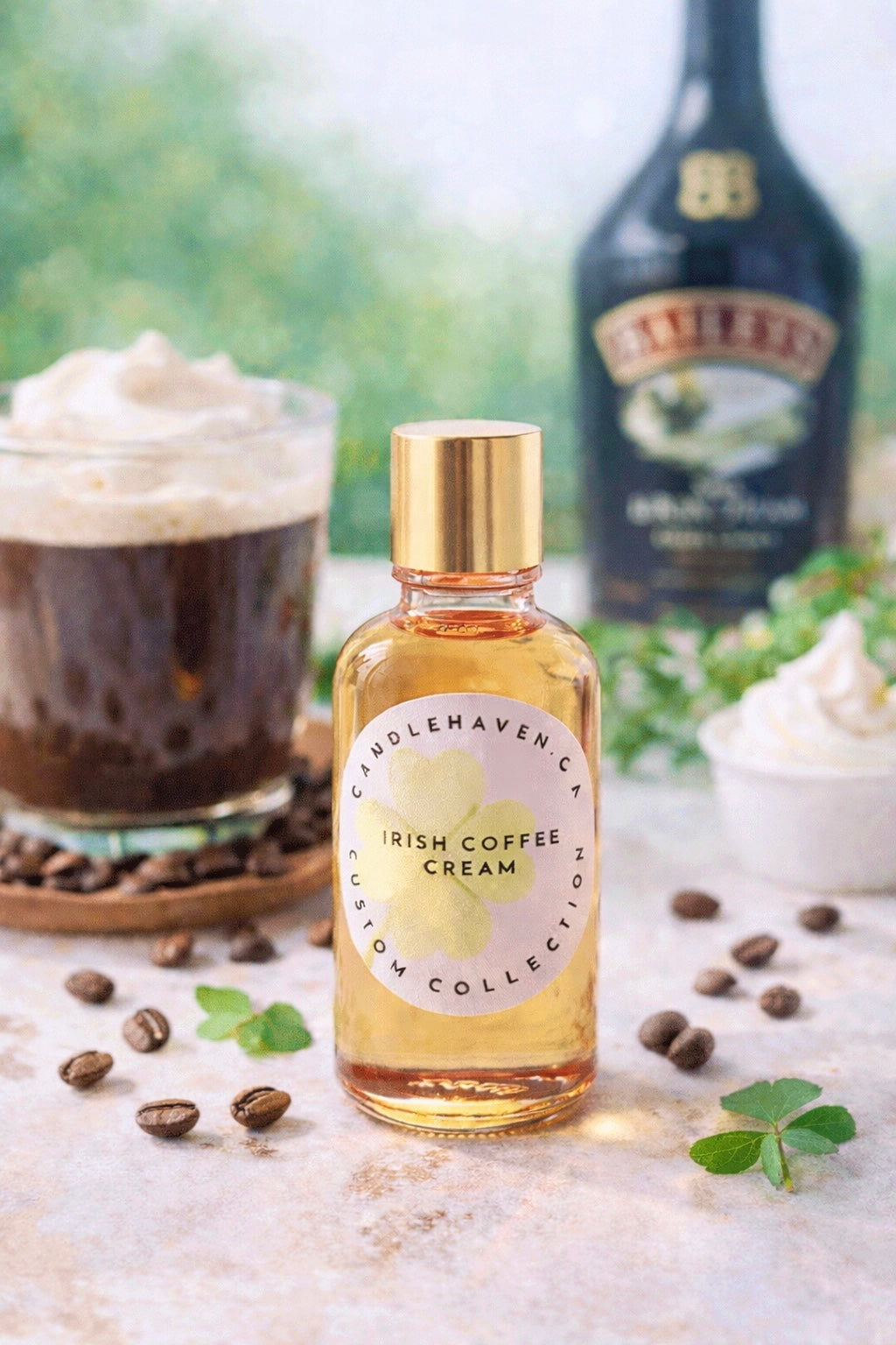 Bottle of Candlehaven.ca’s Irish Coffee Cream fragrance oil for candle making with a blurred Baileys bottle and coffee cup in the background.