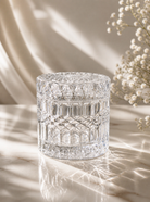 Geo cut clear jar with lid on a light coloured background 