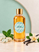 Minted Vanilla Bliss fragrance oil for candle making by Candlehaven on a light surface with a light green background 