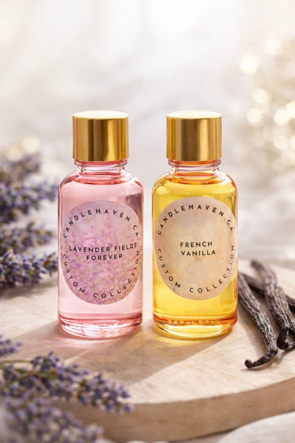 Two bottles of Candle Haven Co. fragrances on a wooden surface with lavender and vanilla beans.