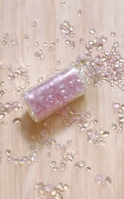 rose quartz min chips are the stone of love used to decorate candles