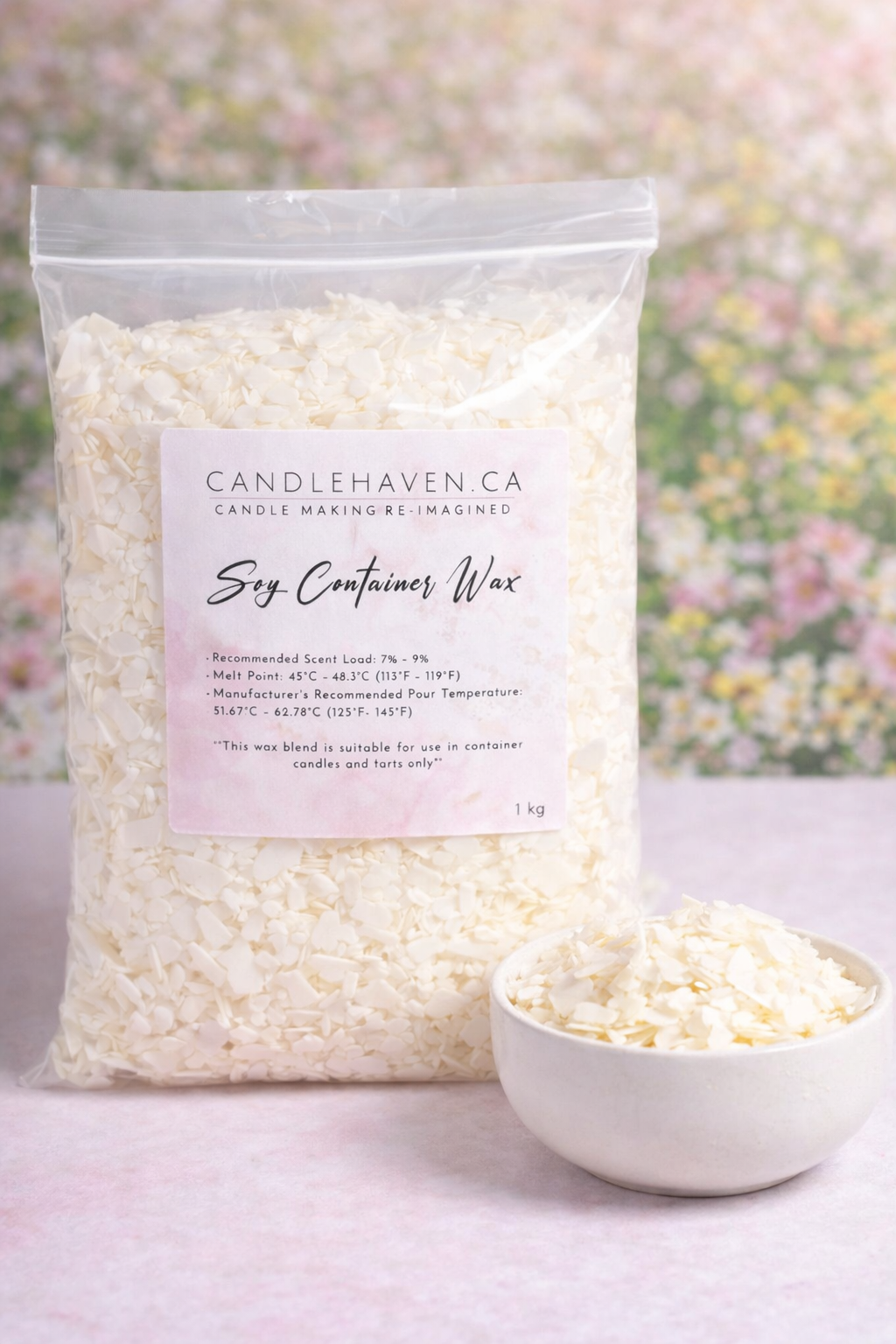 Bag of Candlehaven soy container wax with a bowl of wax on a floral background