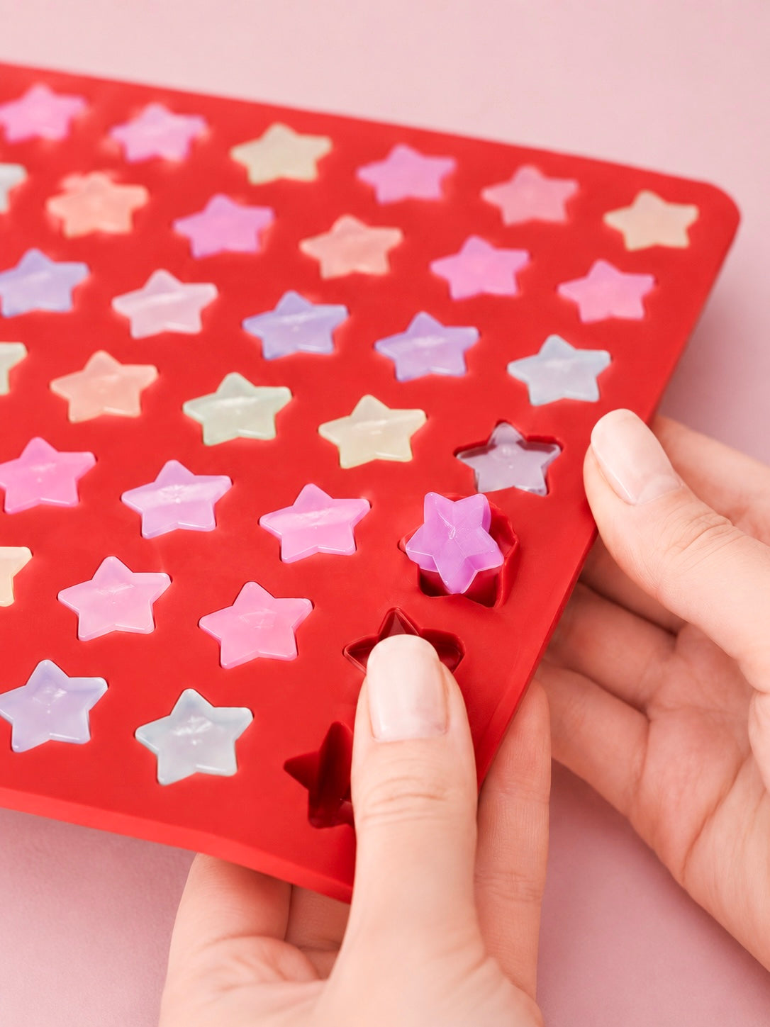 Silicone Mold with star shapes used in this picture to make candles