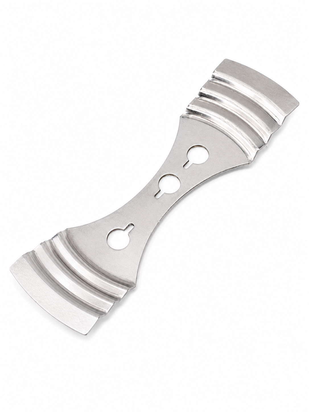 Metal wick setter used to secure candles on a white background