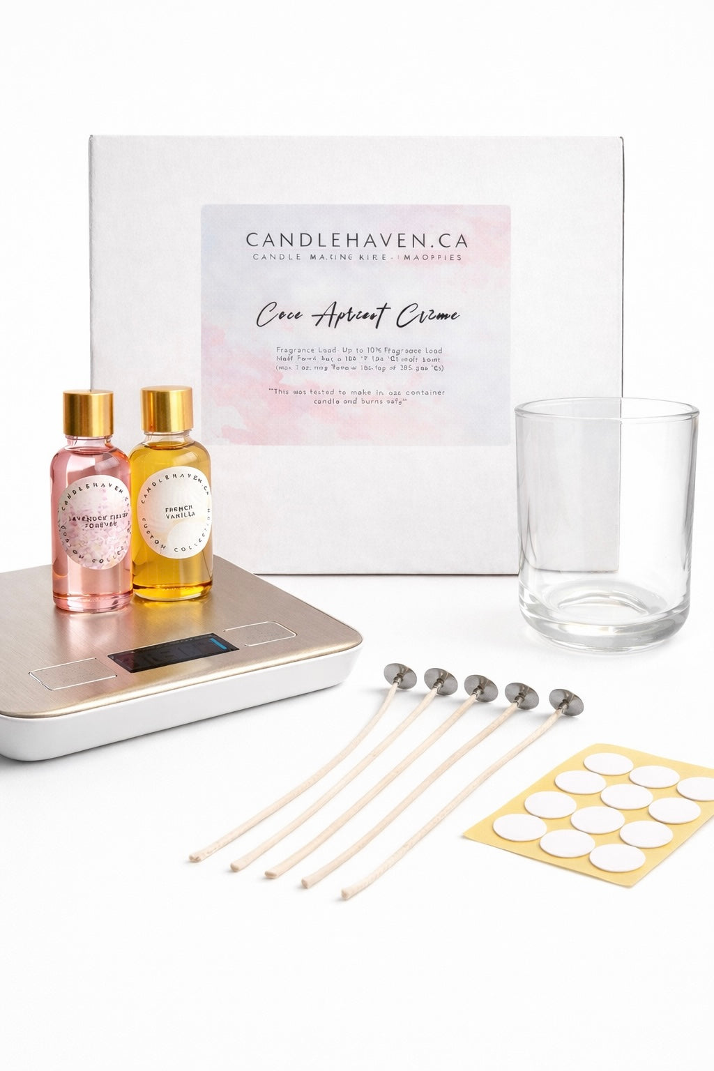 Candle making kit with coco apricot wax, fragrance oils, digital scale, wicks, wick stickers, and a Gaia vessel on a white background